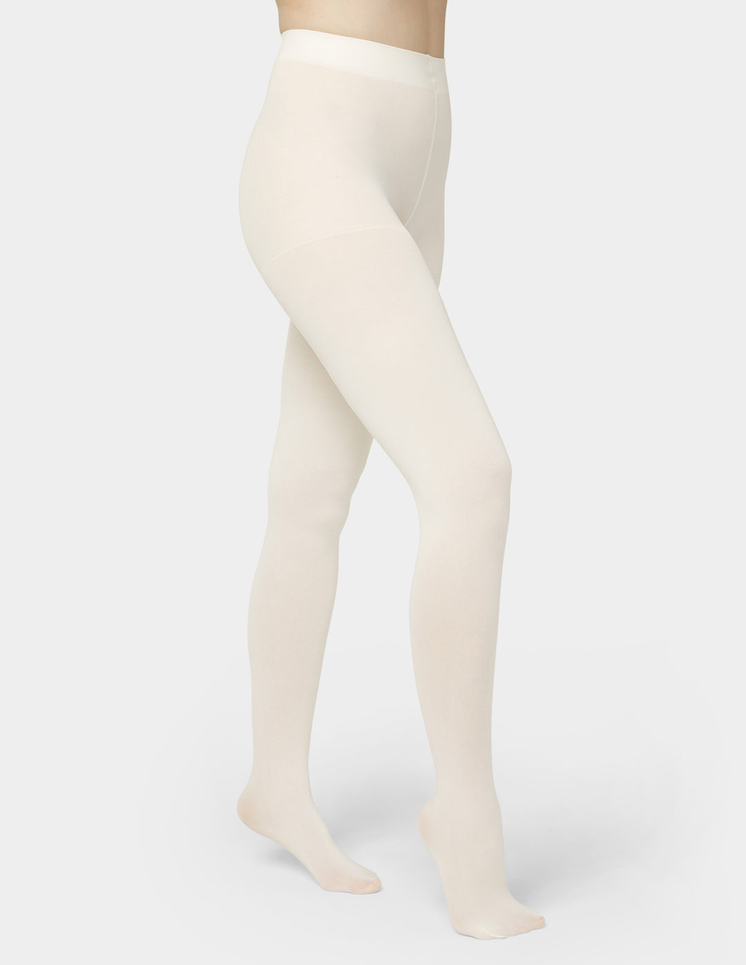 Beige tights worn by a person on a white background