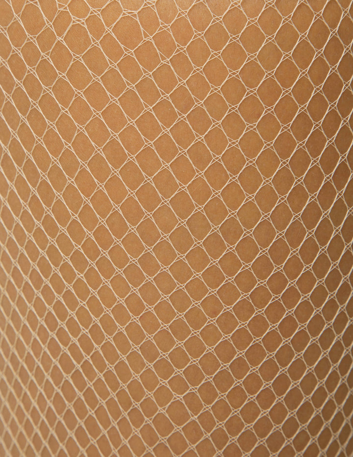 Close-up of beige fishnet fabric with a diamond pattern